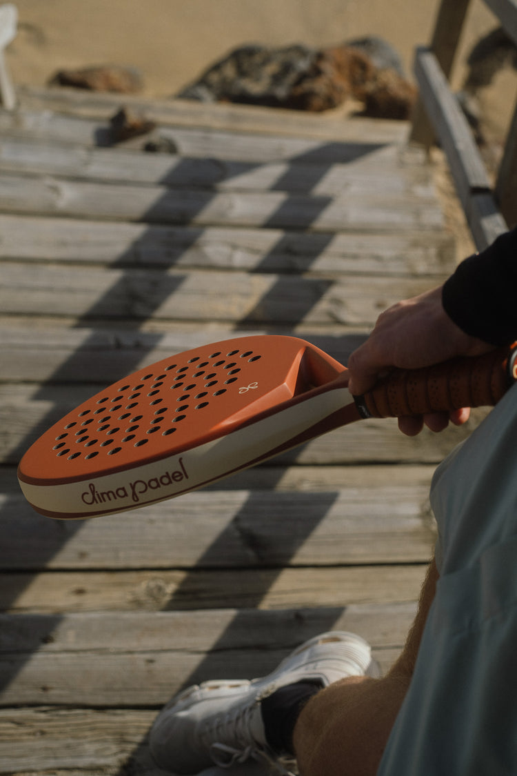Clima Wave racket in hand